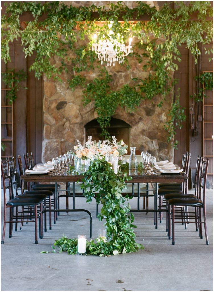 Wedding party head table floral and greenery setting by Essen Events at Hope Glen Farm
