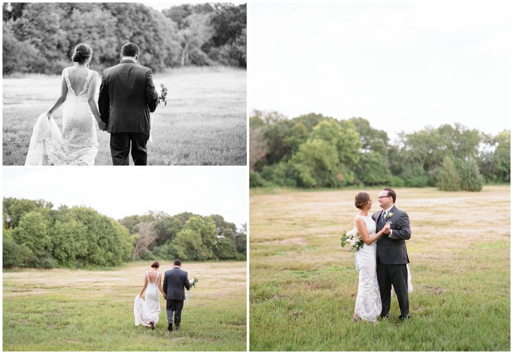 Bride and groom hugging each other and walking in a field outdoors at Green Acres Event Center