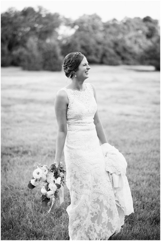 Fine art portrait of Minnesota bride outdoors at Green Acres Event Center wearing Effie's Bridal Trunk gown.