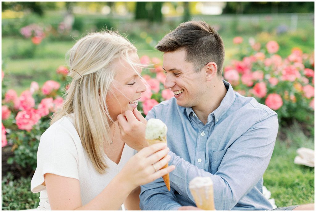 a smiling couple eats ice cream in Minneapolis