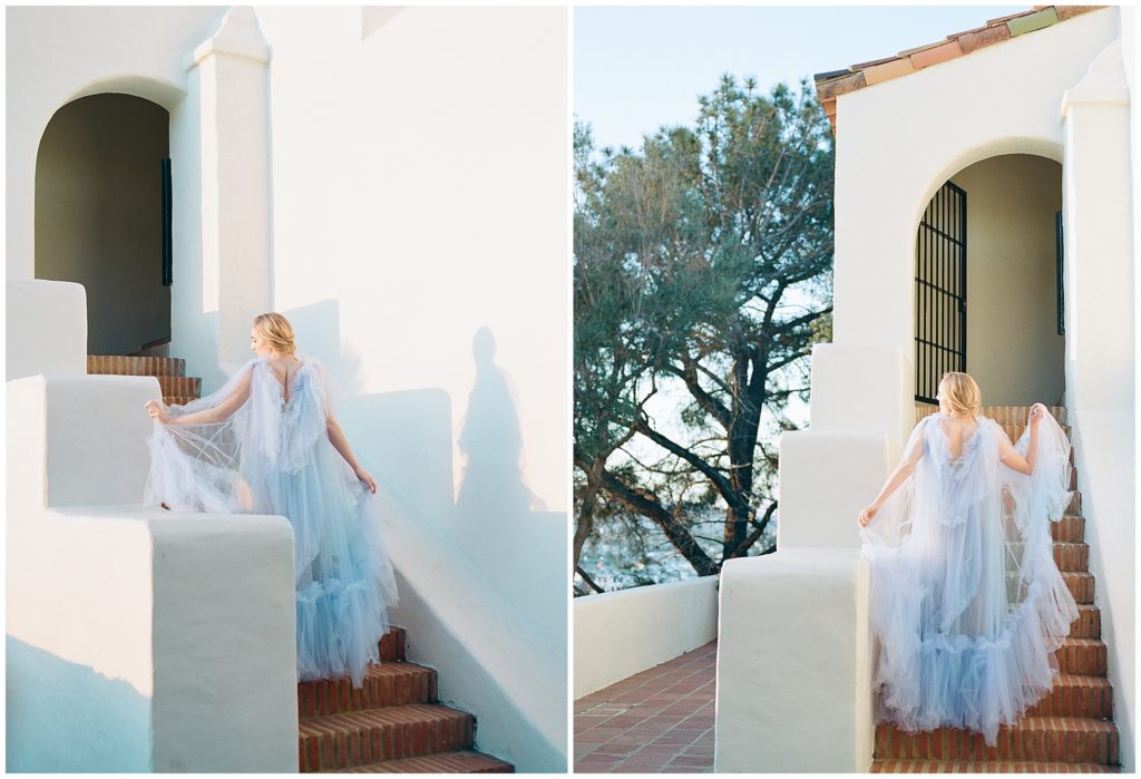Outside of Junipero Serra Museum, a blonde bride walks in her blue, Elizabeth Dye wedding gown in fine art photographs at sunset