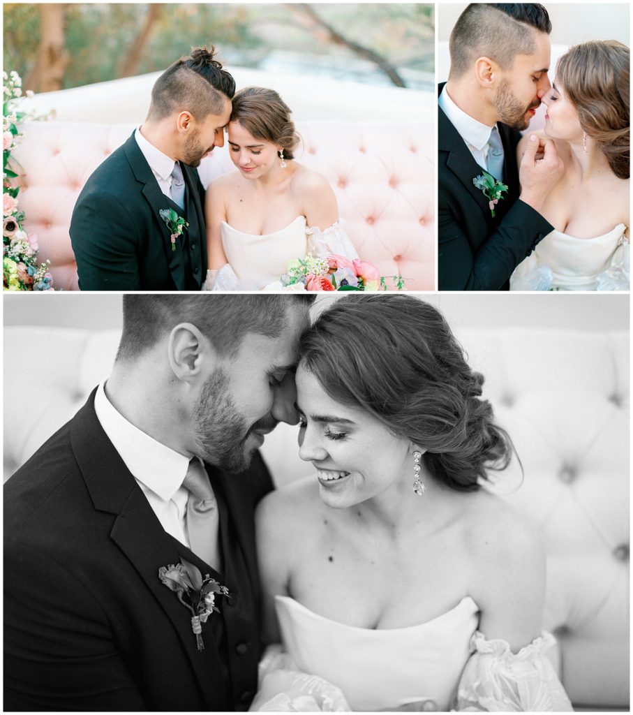 A newly married couple shares a tender moment outside during sunset, surround by colorful orange, white and pink flowers during their intimate wedding