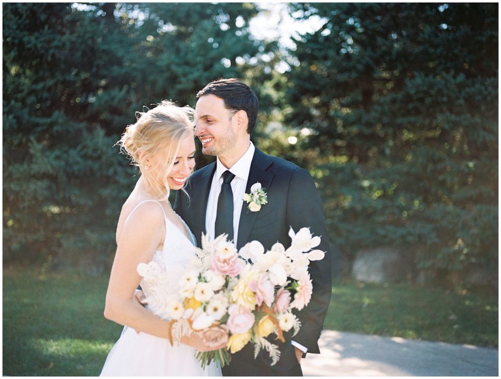 At their outdoor Minnesota wedding, couple portraits on film